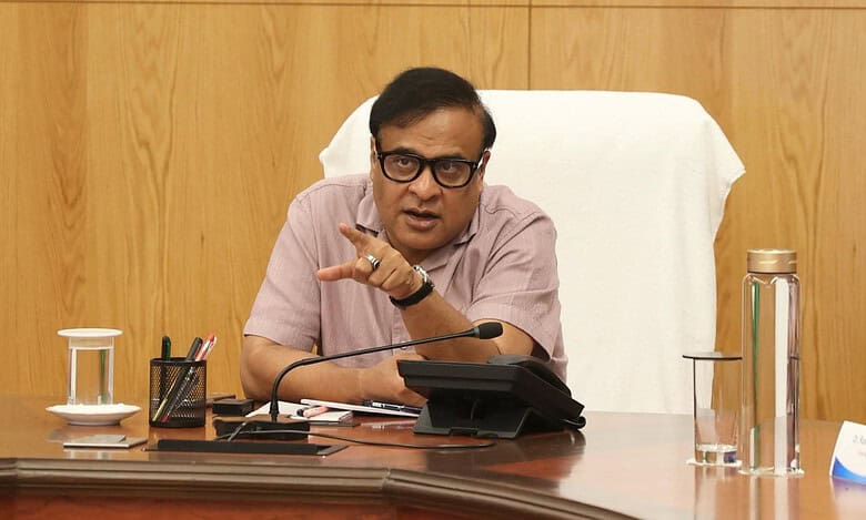 The image displays a picture of Assam CM Himanta Biswa