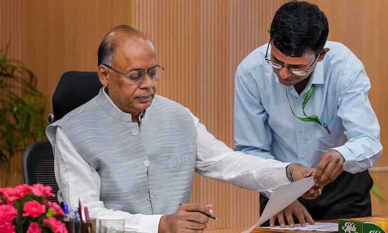 The image displays a picture of newly appointed UPSC Chairman Ajay Kumar