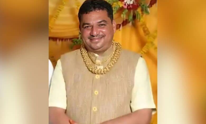 The image displays a picture of Balvant Khabad, son of Gujarat minister state for panchayat and agriculture Bachubhai Khabad