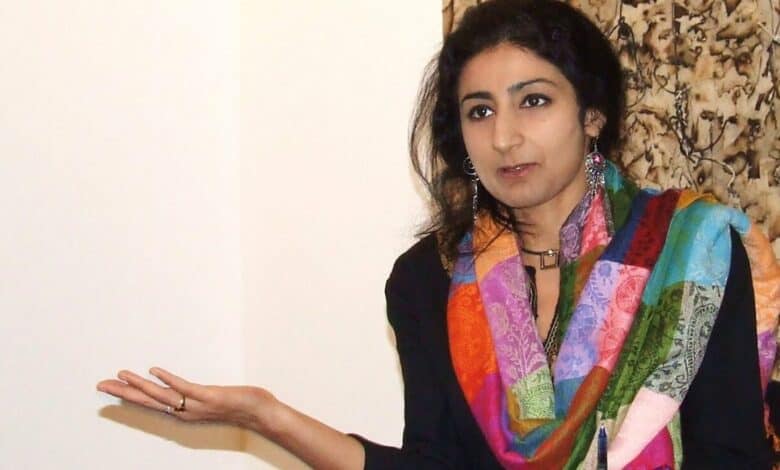 The image displays a picture of professor Nitasha Kaul