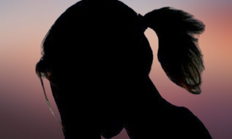 The image displays a silhouette of a girl with a reddish background