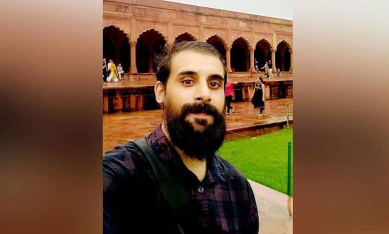 The image displays a picture of journalist Omar Rashid