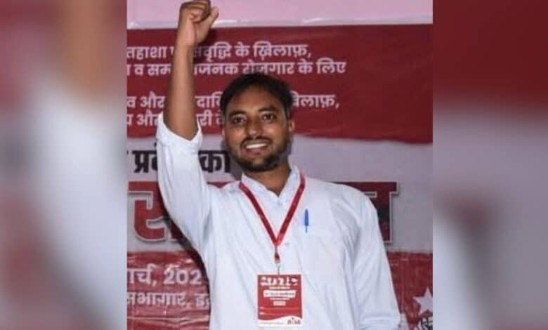 The image displays a picture of a Dalit PhD scholar Manish Kumar