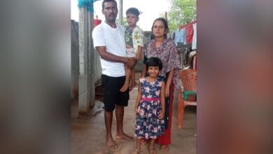 The image shows Talari Bhaskar and his family. He, along with two others from his village were rescued from a criminal case in Malaysia.