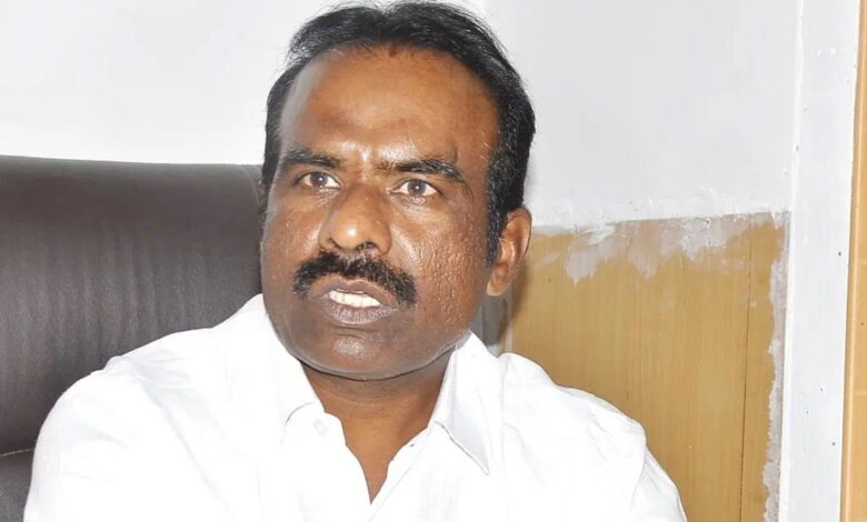 The image displays a picture of Karnataka BJP leader N Ravikumar