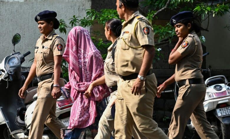 Police personnel produce Sunita Jamgade, a nurse who was repatriated by Pakistani authorities through the Attari-Wagah border on Saturday
