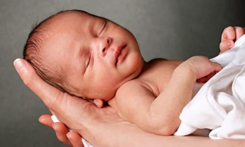 the image displays a picture of a baby