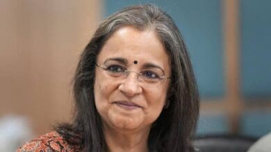 The image displays a picture of Ex-SEBI chief Madhabi Puri Buch