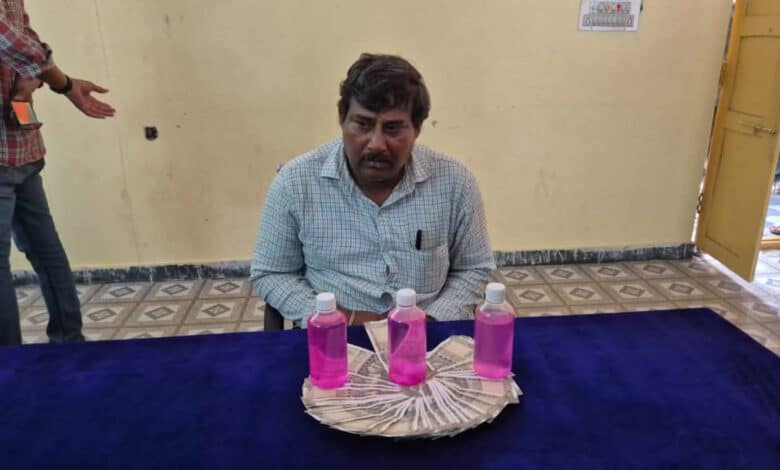 The image display a picture of a government officer in Telangana caught by ACB while taking bribe