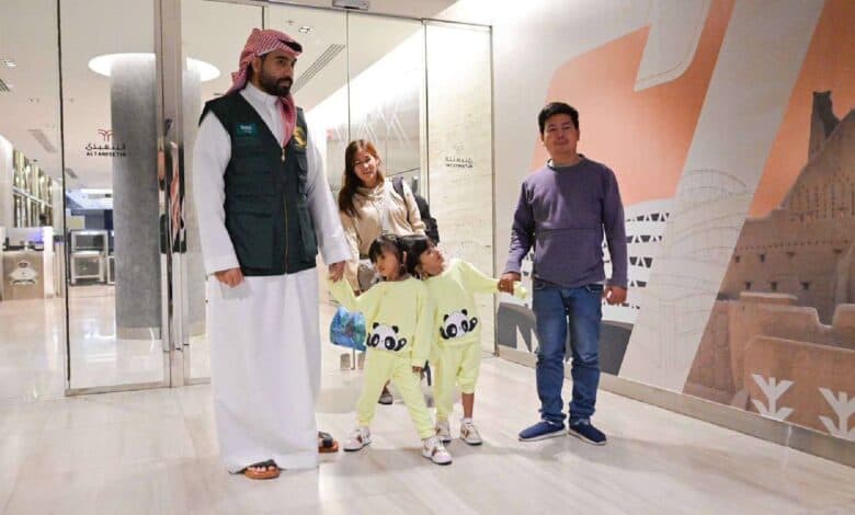Filipino conjoined twins Klea Ann and Maurice Ann Misa arrive in Saudi Arabia with their parents.