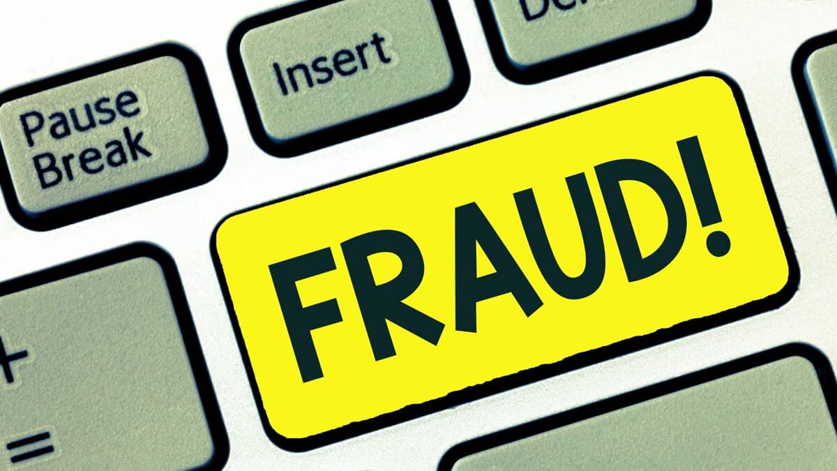 Representational Image of fraud written on keypad