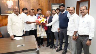 Members of the newly formed NRI Advisory Committee present a bouquet and shawl to Telangana Chief Minister A Revanth Reddy during a courtesy visit at his residence in Hyderabad on May 5.