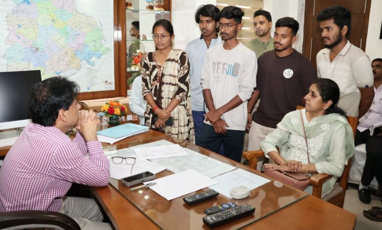 Photo of Telangana Bhawan commissioner in New Delhi Dr Uppal meeting students from the state.