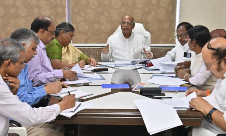 The image shows Telangana BC Commission members holding a review meeting to discuss various issues in Hyderabad on June 5, 2025.