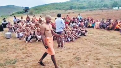 Family members of the tribal woman during the purification ritual