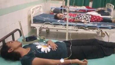 Image shows nursing students in Mahbubabad laying on hospital bed after suffering food poisoning