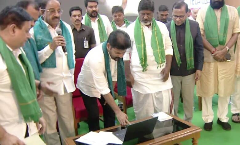 The image shows Telangana CM A Revanth Reddy releasing the Rythu Bharosa crop input financial assistance during Rythu Nestham programme in Hyderabad on Monday, June 16, 2025.