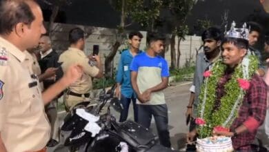 The image displays a picture of Uppal police officer taking class of a birthday boy wearing a crown