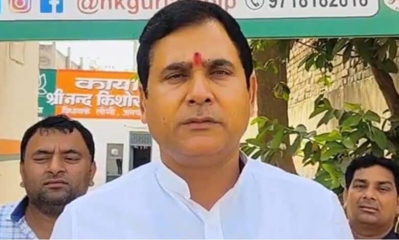 The image displays a picture of BJP Loni MLA Nand Kishor Gurjar