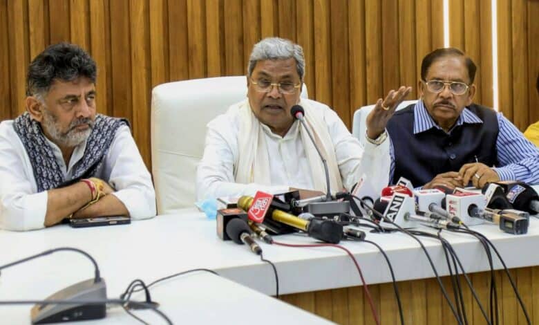 The image displays a press conference with the Karnataka CM Siddarammaiah, Deputy Cm DK Shivakumar and state home minister G Parameshwara