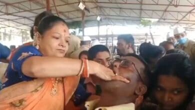 A man is fed Fish Prasadam in Hyderabad
