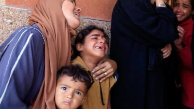 The image shows families mourning the death after Israeli strikes killed atleast 65 people in Gaza on the second day of Eid-Al-Adha