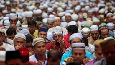 The image displays a picture of Muslim population