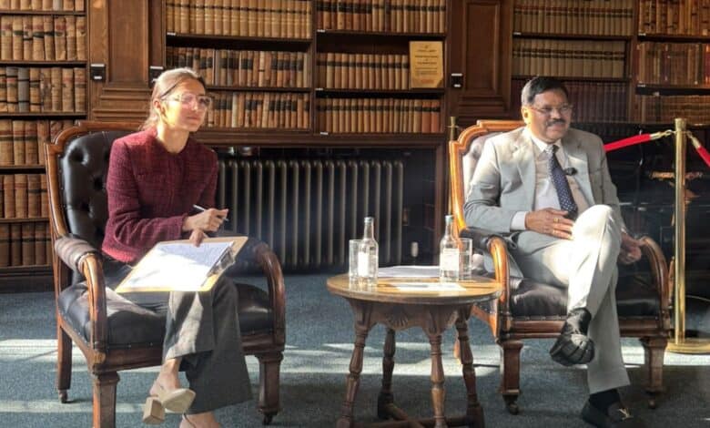 The image displays a picture of CJI Gavai at the Oxford Union in the UK