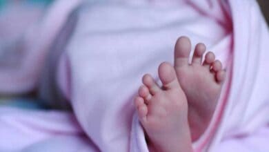 A representational image depicting a newborn baby
