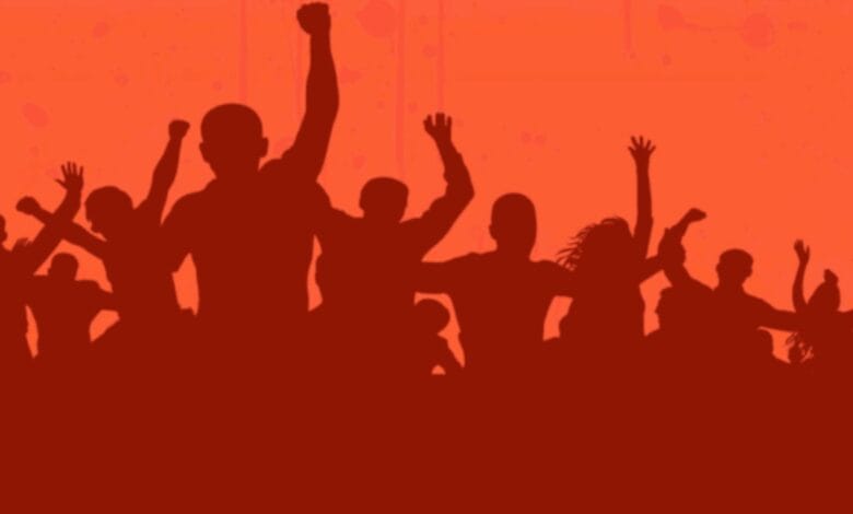 The image displays a picture of communal clash