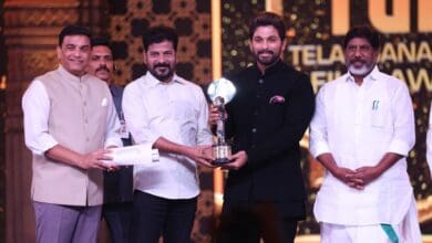 Allu Arjun receiving the Best Actor award from Telangana CM and deputy CM