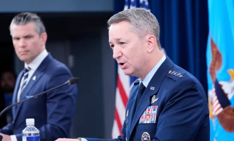 US defence secretary Pete Hegseth (background) briefing the press with chairman of the joint chiefs of staff Gen Dan Caine (foreground) on Sunday
