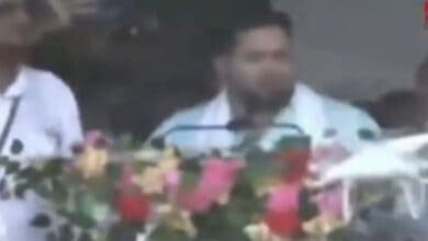 RJD leader Tejashwi Yadav ducks on stage