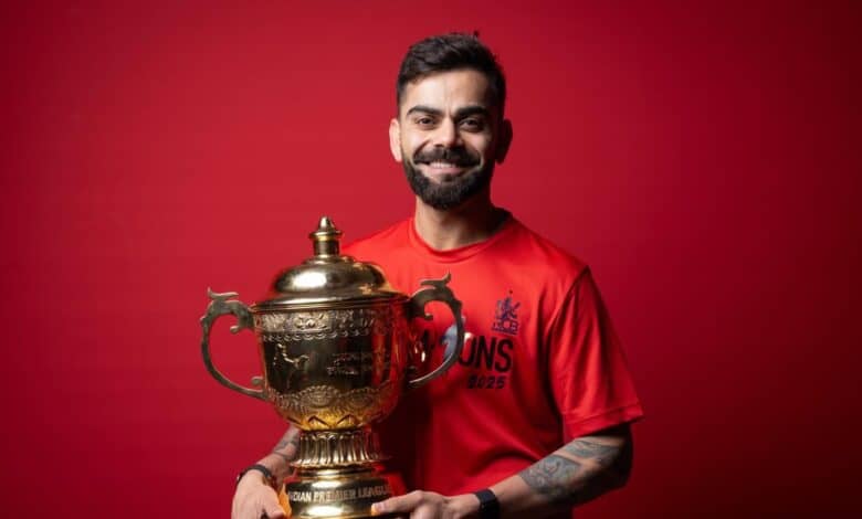 Indian cricket player Virat Kohli with IPL 2025 trophy