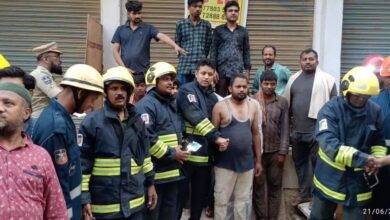 Officials with the rescued 12 workers after a fire accident was reported in fire Asifanagar, Hyderabad