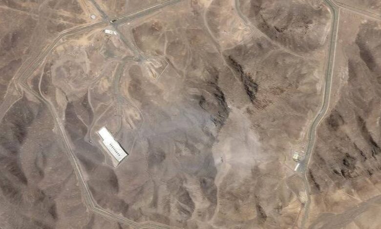Satellite image of Iran’s Fordow nuclear enrichment facility, showing mountainous terrain with visible access roads and structures, following a reported US air strike on June 22, 2025.