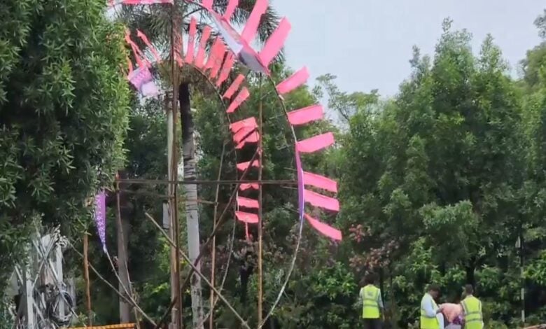 GHMC workers remove posters of KTR in Hyderabad