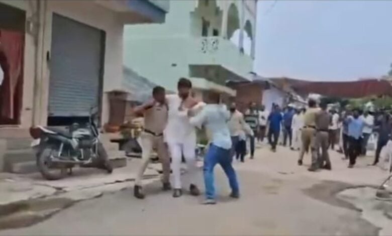 The image shows Telangana Congress NRI Cell leader N Devender Reddy being attacked by BRS MLA's henchmen in Balkonda on Thursday, July 17, 2025.