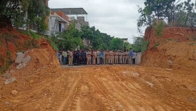 The image shows the demolished compound wall built by a realtor in Nizampet municipality of Dundigal mandal in Medchal-Malkajgiri district.