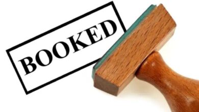 a representational image depicting a person is booked for crime.