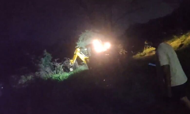 A bulldozer seen removing plantations at the Botanical Garden of Telangana Agricultural University in Hyderabad on the intervening night of Saturday and Sunday