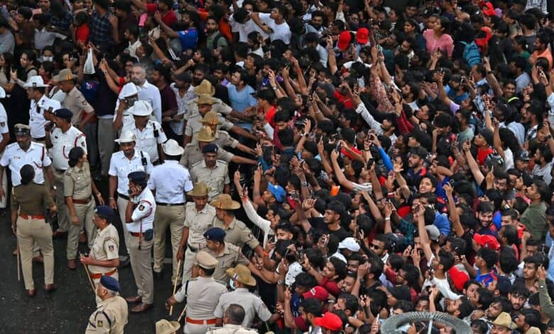 Massive crowd waits for a glimpse of winning team Royal Challengers Bengaluru team during the felicitation ceremony in Bengaluru