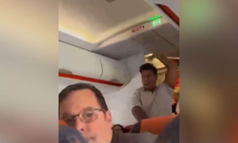 Screengrab of Hindu man, Abhay Naik, shouting inside a flight