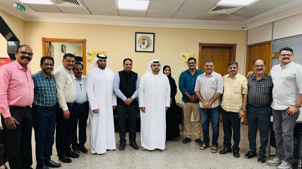Group photo of Indian Association Sharjah members and Sharjah Police officials at a meeting to launch the Family Dispute Redressal Committee.