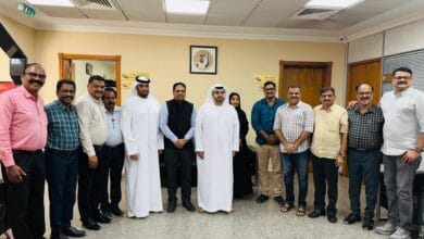 Group photo of Indian Association Sharjah members and Sharjah Police officials at a meeting to launch the Family Dispute Redressal Committee.