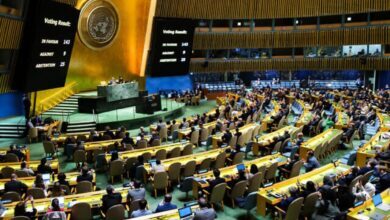 Delegates vote inside the UN General Assembly Hall during a high-level meeting on the Israel-Palestinian two-state solution.