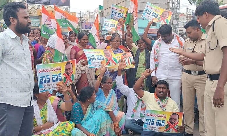 The image shows Dalit Congress workers from Siddipet district protesting against DCC president T Narsa Reddy on Friday, August 15, 2025.