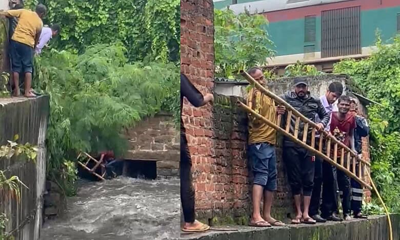 The image shows HYDRAA's disaster response team rescuing a man from Musi nala near Yakutpura rainwal station on Wednesday, August 13, 2025.