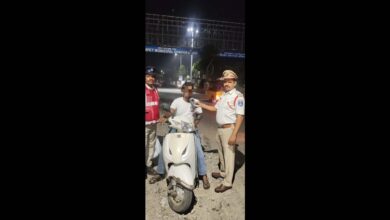 A man blows into a breathalyser in the Cyberabad commissionerate