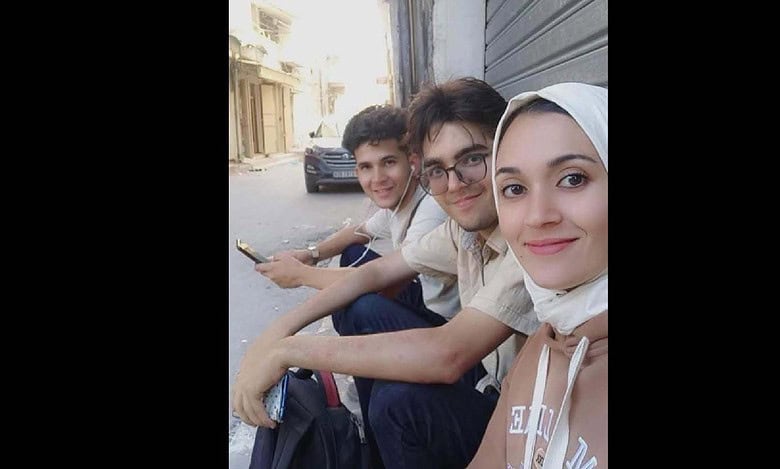 Palestinian journalist Marwa Musallam with her brothers